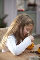 Girls making pomanders