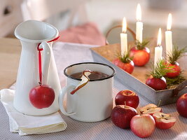 Tea made from apples (Malus), apples as candle holders