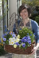 Woman with planted basket, Salix caprea 'Kilmarnock'