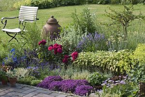 Herb bed with roses and willow edging