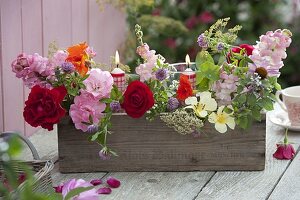 Small bouquets of Rosa (roses), Anthirrhinum (snapdragons)