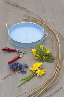 Willow wreath with primroses and daffodils