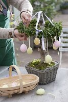 Easter table decoration with box wreaths