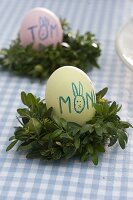 Easter table decoration with box wreaths