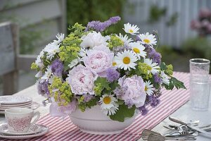 Early summer bouquet with Paeonia (peonies), Thalictrum (meadow rue)