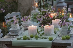 Romantic table decoration with perennial peas