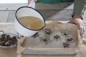 Self made Christmas tree decorations from wax and star anise