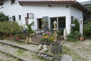 Entrance to the pottery workshop decorated with pottery cats