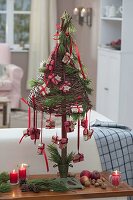 Miniature willow tree as Advent calendar, decorated with Pinus (pine)