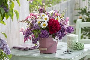 Scented bouquet of Syringa (lilac), Leucanthemum (daisy), Paeonia