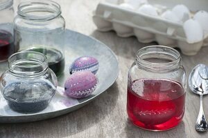 Egg coloring with wax reservation technique