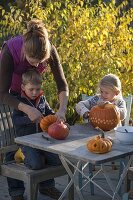 Carving pumpkins with children
