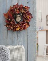 Leaf wreath of Prunus (ornamental cherry) in autumn colours