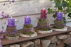 Umwickelte Tontoepfe als Kerzenhalter