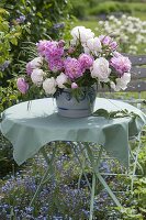 Lush Paeonia and grasses bouquet in salt glaze pot