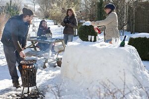 Snow bar in the winter snowy garden