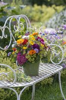 Variegated bouquet of pink (rose), calendula (marigold)