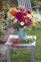 Putting cottage garden flowers bouquet