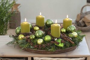 Advent wreath made of mixed coniferous green, decorated