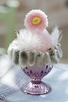 Pink breakfast egg in eggcup with catkins sleeve