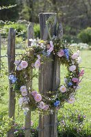 Wicker wreath with spring flowers