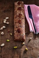 Vegan, gluten-free date strudel with pistachios and pecan nuts