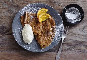Cappuccino and chocolate crêpes with a white chocolate cream quenelle