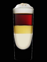A layered drink with eggnog against a black background