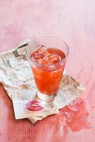 Campari in a glass with ice cubes
