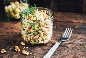 White bean salad with leak, spring onions, apples, dill and walnut, vegan