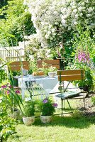 Bundt cake on table in summery garden