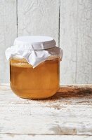 Homemade Kombucha tea in a sealed jar