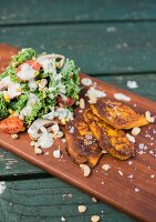 Pumpkin fritters and a colourful salad