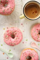 Pink doughnuts and coffee