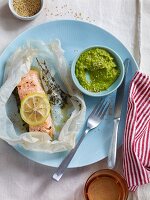 Lemon salmon parcels with mushy peas