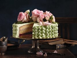 Raspberry and pistachio cake, sliced