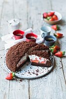 Strawberry cake with chocolate sprinkles and eggnog cream