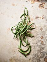 Green beans on a vintage background