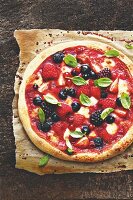 A sweet berry pizza with mozzarella