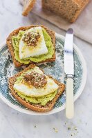 Toast with avocado cream and fried eggs