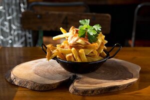 French fries in an iron pan