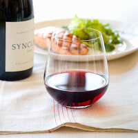 Glass of red wine with grilled salmon