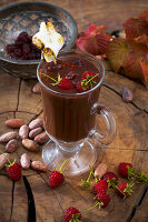 Hot drinking chocolate with raspberries