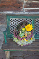 Autumn arrangement in basket with handle