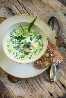 Wild herb soup with Schüttelbrot (crispy unleavened bread from South Tyrol)