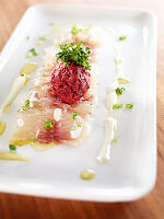 Marinated whitefish with beetroot tartare and sour cream