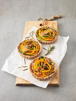 Pumpkin and leek tartlets with nuts