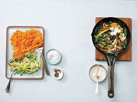 Sweet potato spirals in a chard sauce being made