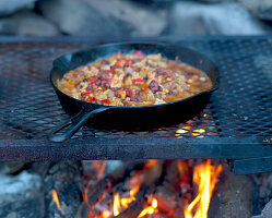 Chili in a pan on a campfire
