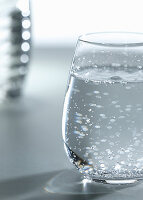 A glass of water with bubbles